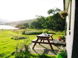 Self catering cottages overlooking Loch Teacuis Morvern on West Coast of Scotland